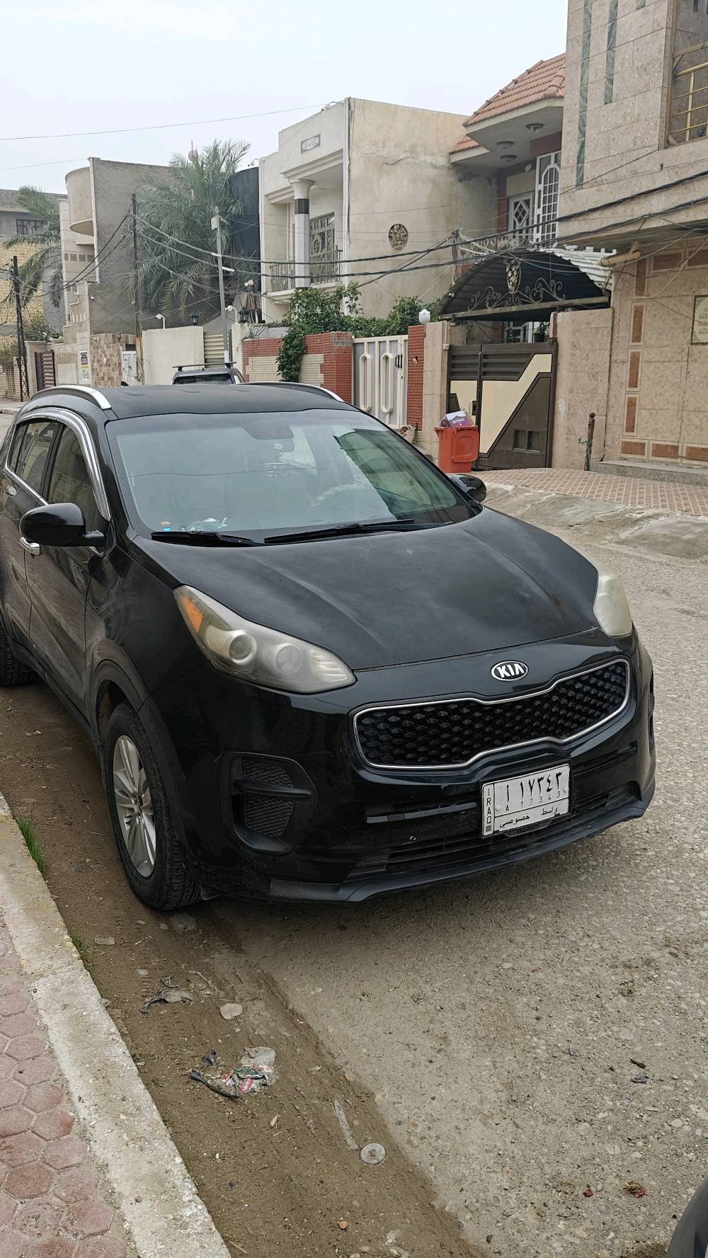 كيا سبورتج وارد امريكي ضرر باب لون اسود رقم واسط
