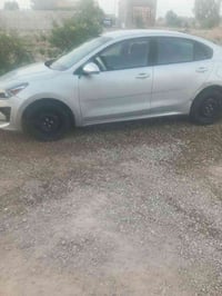 كيا ريو22 أمريكي سياره جاهزه اخر حبايه كير ومحرك كفالة وكهربيات وحدادي...