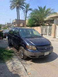 دوج كرفان موديل 2007رقم بغداد بسمي تحويل ثاني يوم سياره بلاديه وجاهزه ...