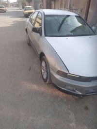 لانسر موديل ٢٠٠٠ بغداداوتماتيك كورلا حائز ثالث السعر ٢٥ هاتف 077109042...