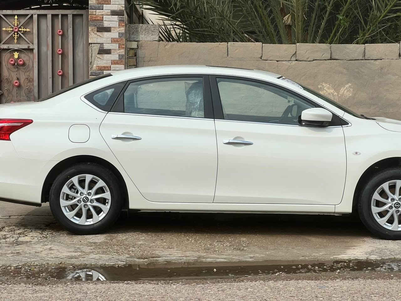 نيسان سنترا 2025 زيرو مماشيه ضمان شركة نيسان السور فول مواصفات العلامة الجديدة رقم بغداد الجديد بأسمي 
تجميع صيني 
مواصفات السيارة 
محرك 1.6 اربعة سلندر 
فتحة سقف 
سويج ريمونت 
تحكم ستيرن 
شاشة وسطية 
كاميرا خلفية 
تبريد خلفي 
جام 4 اوتوماتيك 
تحكم كهربائي للمري
داخل بيجي
بروجكتر امامي 
الشباك الجديد ( العلامة الجديدة ) 
 يدات كروم 
ويلكب كروم 
السعر/135نهايته
الهاتف/***********
بغداد/ قرب بسمايه/ مجمع الاحسان
