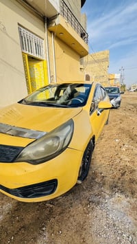 كيا ريو 2015  تكسي للبيع خليجي قطرتين كيج حماوة مو گلوب محرك 1600 بيها...