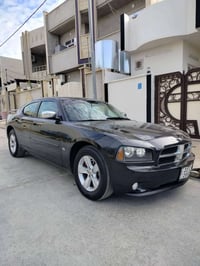 للبيع سعر 128$ دوج جارجر sxt بلص موديل 2010  ماشي 267 ألف استخدام شخصي...