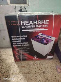 غسالة جديدة • ١٢كيلو • بالكرتون