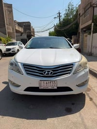 ازيرا 2012 ماشية 96100 كم بيه جاملغ خلف السايق صبغ والباب الخلفي كلير ...