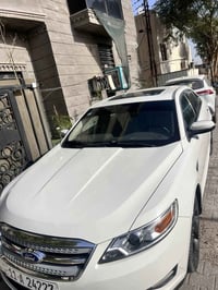 فورد تورس ٢٠١١ خليجي شركه نيفا  اللون ابيض سلايد روف  رقم بغداد  السيا...