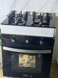 طباخ للبيع بلتن مع فرن نوع شامي مع مرشحة  شغال وكامل  زولية ايراني اصل...