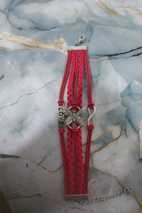 سوارات الصداقات من الجلد وفيه فراشة كبيرة وعلامات حب 