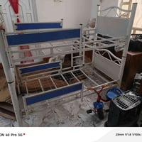 تخت أطفال طابقين • موصل الايمن الهرمات