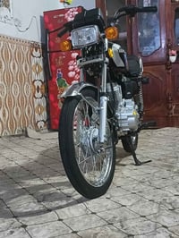 دراجه للبيع موديل 25 مكينه 150 خمسه نمر سلف أوراق سكنر 07741992332