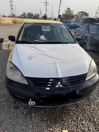 لانسر • ٢٠١٠ • نمره ثالثه
