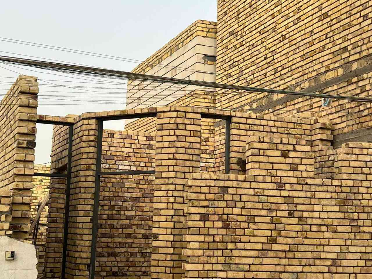 خلفه بناء متفرغ مكاني سوق الشيوخ ***********
