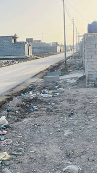 قطعه زراعي للبيع مساحه 100 متر   حي الجوادين شارع لامام الصادق التبليط...