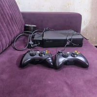 اكس بوكس 360 لا مفتوح ولا مصلح بي ٢٣لعبه وياه اقراص 50 قرص عنوان بغداد...