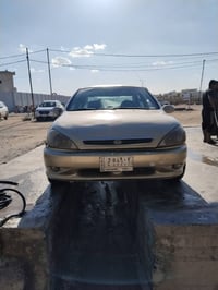 كيا ريو 2002مراوس بادوات للتواصل واتس 07838977249