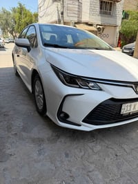 عندي كورلا موديل 25 كفاله عامه من ضربه و صبغ و بارد رقم بغداد بسمي مكا...