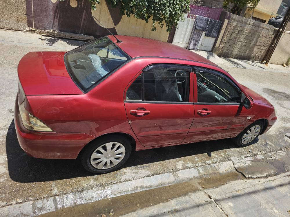 مسيبوشي لانسر 2011 رقم بغداد كير اوتماتيك نضيفه جدأ او ***********/*********** بغداد, العراق
