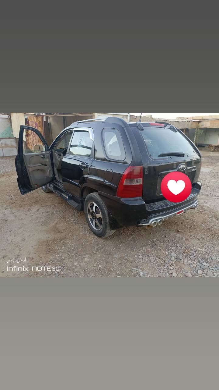 عندي أسبورتج موديل 7 مصبوغه عام مكينه 6سلندر گير محرك تدفئه تبريد مكفول سعره 75 وبيها مجال هزه جديده بأسمي تحويل مباشر رقم ديالى ***********
