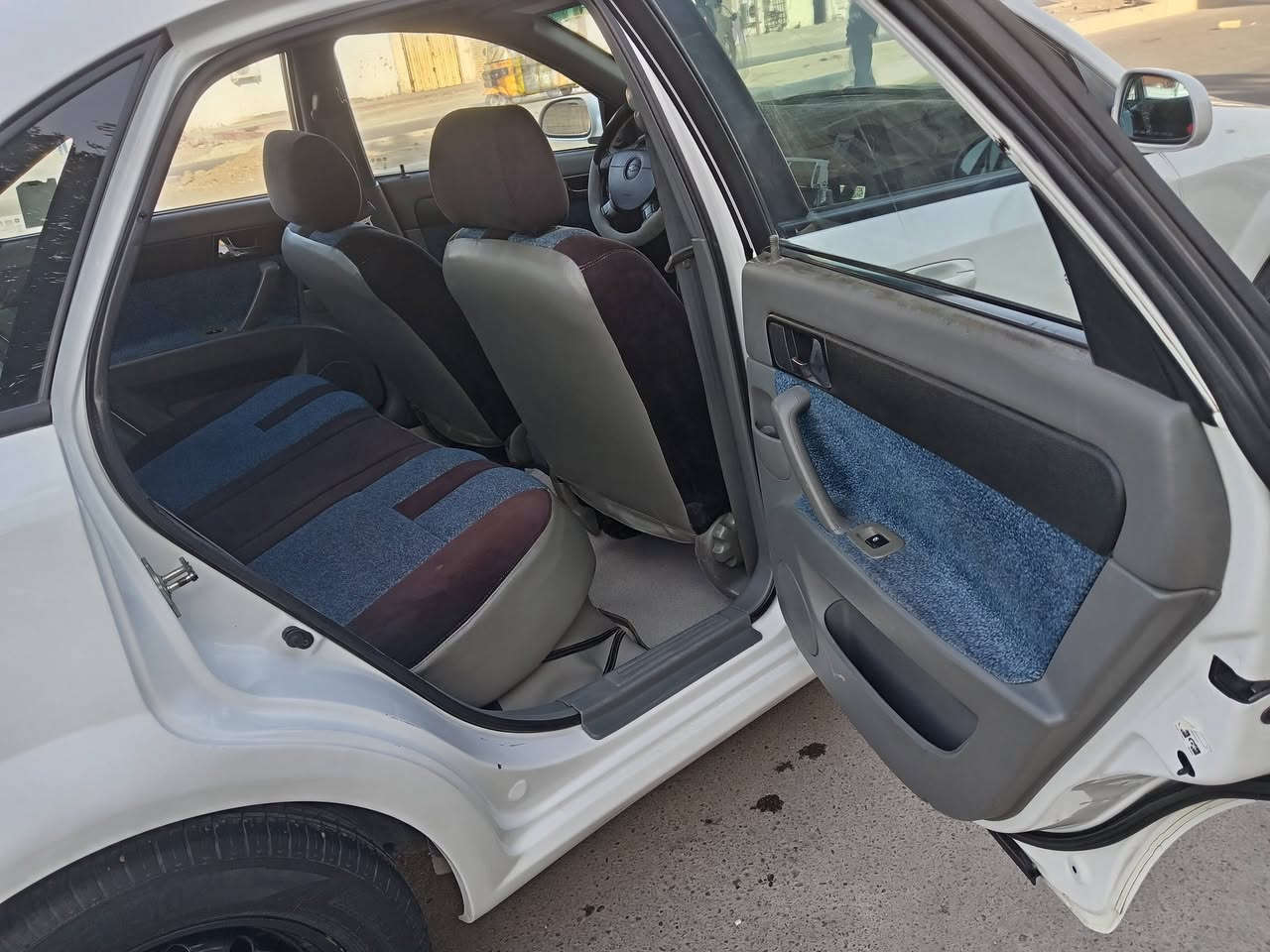 سلام عليكم لبيع موديل ٢٠١٣ سيارة جاهزة تبريد تخم تاير جديد دوشمة محرك وكير مكفولآت سنوية جديدة حداديه جديد مدينة الصدر هاتف ***********
