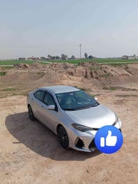 كورلا 2016رقم بغداد وارد امريكي مصبوغه عام السعر 120/وبيها مجال  07731...