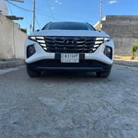 هونداي توسان خليجي رقم بغداد الماني بسمي  موديل ٢٠٢٠ شكل ال٢٤ لون ابيض...