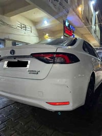 كورلا هايبرد ٢٠٢٤ ماشيه ٤٣ الف  بغداد  كرسي كهرباء  اوتو هولد  فتحة سق...