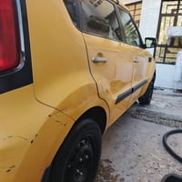 لكيا صول 2013 صفره محرك 2000 تبريد شاشه كبيره تخم تاير رقم بغداد مصفره...