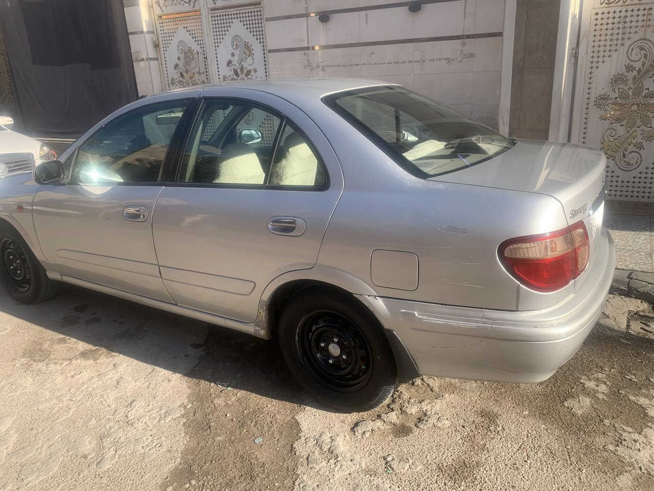 سلام عليكم نيسان سني مديل 2001مصبوغه عام مكاب بغداد البلديات السعر 65  مجال بصيط محرك 1800الرقم ***********
