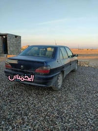 بعد التحية. بيجو 306. م 2003/ رقم وهزه وسنوية جديد.  38 07810428025