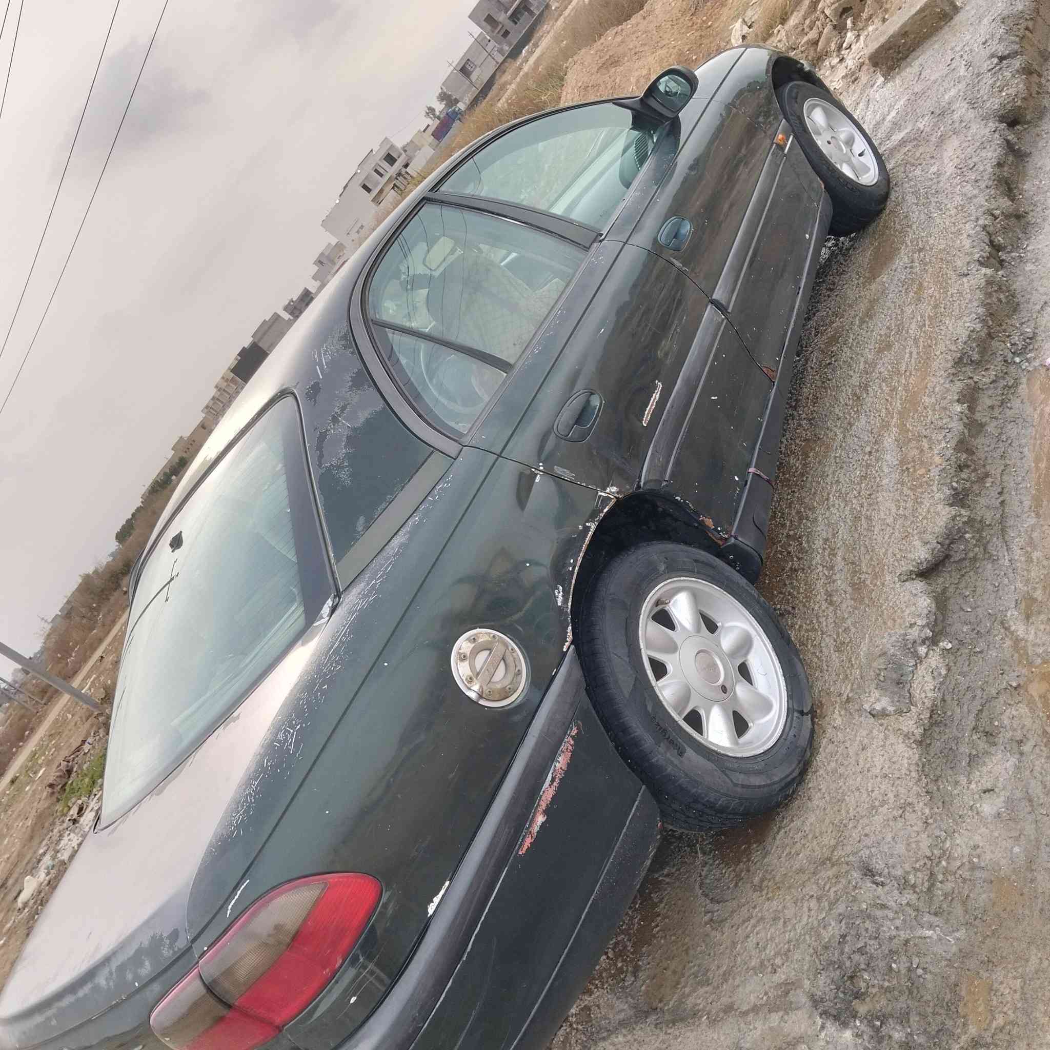 سلام عليكم ورحمة الله وبركاته وبل بزون موديل 1995 مكينة 2000مكينه وكير عادي خير من  الله وبسمي سياره بلاديه وترايك وين ما يعجبك سعر 30  رقم كركوك ***********
