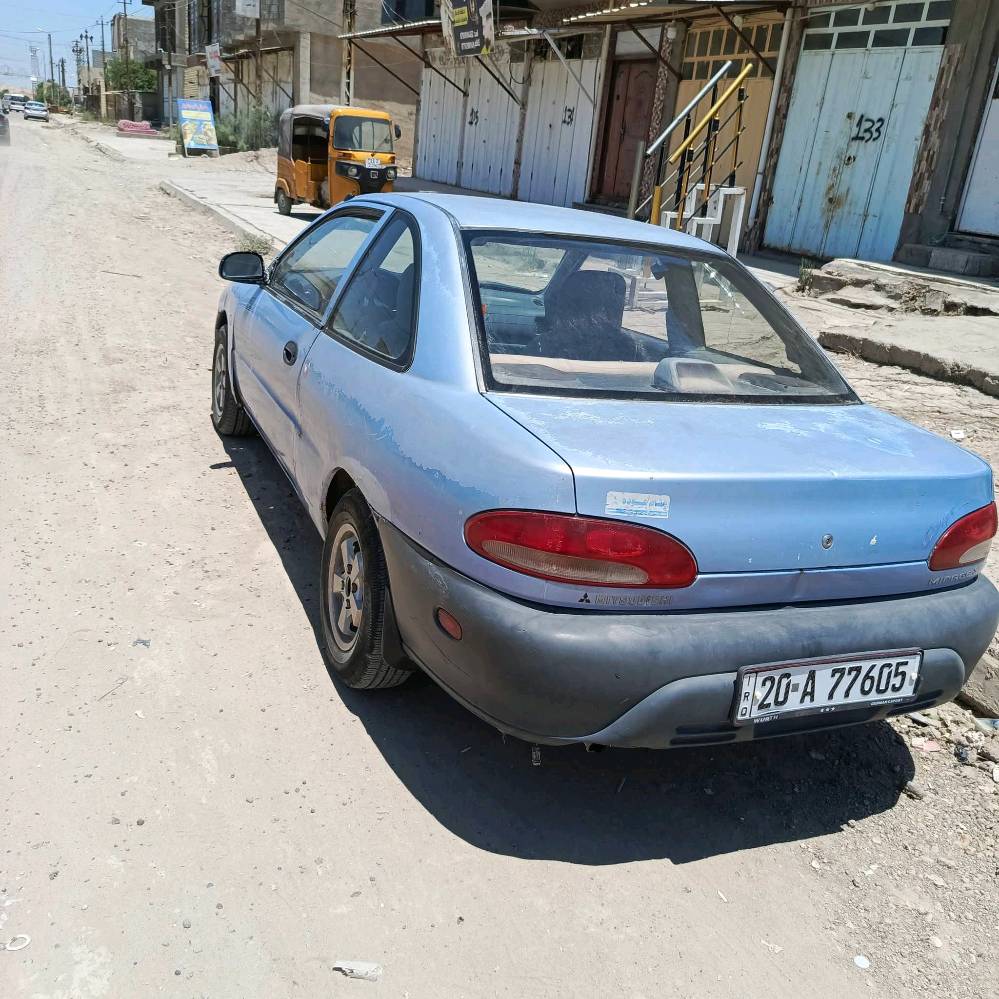 سياره مسيبوبوشي ميراج 1994 تك باب كير عادي كير محرك مكفولات غرفته نضيفه الكشر شوفة عين رقمه ديالى مكاني بغداد سبع البور***********