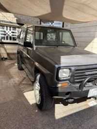 داهاتسو1993 محرك 3y  كير عادي  فور ويل   50   07733378886