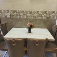 ميز مرمري • ١٥٠×٩٠سم • ٦ كراسي جلد