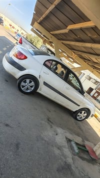 للبيع أو مراوس ويا النترا  كيا برايد ٢٠٠٩ رقم نبار بسمي كاربون بانزين ...