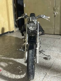 هارلي ستد 400 دراجه نضيف بيها هواي شغلات اضافيه العنوان بغداد سعر 1300...