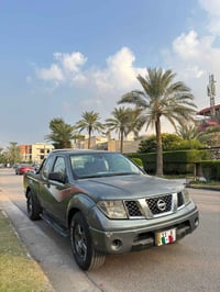 نيسان فرونتير 2008 مكينة V6 4.0  كير اوتماتيك رقم بغداد الجديد السيارة...
