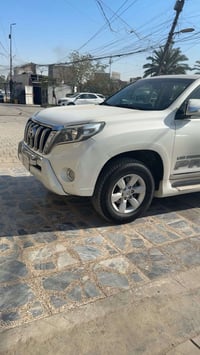 للبيع تيوتا برادو موديل 2014 فئة ال VX اعلى فئة   اللون صدفي رقم بغداد...