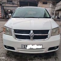 دوج كرفان 2009  ماشيه 97934 السيارة بدون حادث بيه اماكن صبغ اثر شخوط S...