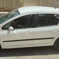 بيجو 307 موديل 2006  رقم بغداد تبريد شغال جاهزة من كلشي  سعر 47 077006...
