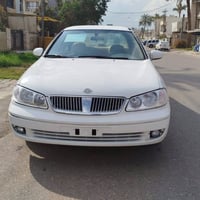 نيسان سني للبيع ياباني موديل 2006 رقم بغداد رقم وهزه جديد كير عادي الس...