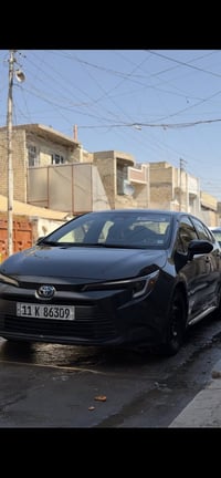 كورلاهايبرد للبيع موديل 23وارد امريكي بغداد بسمي  ماشيه 52 الف مواصفات...