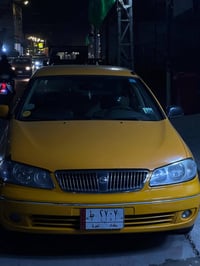 نيسان سني2009ياباني اصلي سياره رقم بغداد بسمي لوحات انكليزي بعدهن عل ا...