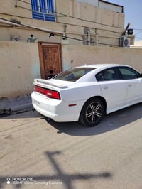 جارجر 2014 بوليسي SRT فرويل رقم بغداد بسمي  السعر135 07815192429