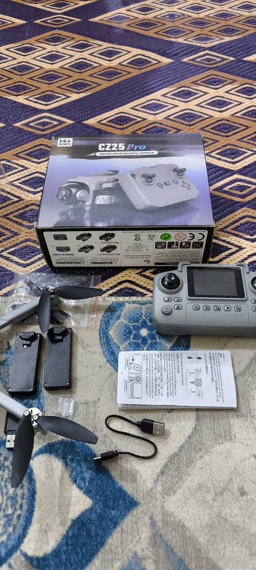 السلام عليكم درون CZ25 max سي زاد ماكس الغنيه عن التعريف . للبيع  1 محركات بدون فحمات من نوع براشليس Brushless
2 مقاومه للرياح العاليه 

3 تدعم 3 مستويات السرعه 

4 كاميرا مزدوجه 4k بالصور و HD بتصوير الفيديو مع زوم تقريب حتى x50   و تكدر تحرك الكاميرا و هي بالجو

5 دبل بطاريه كل وحده من 18 دقيقه إلى 25 دقيقه حقيقي 

6 مسافه 1,200 متر مع ارتفاع 150 متر 

7 بيها نضام طيران ذكي التثبيت في الهواء 

8 تجنب العوائق نضام مانع الصدمات حقيقي 

9 نضام العوده للمنزل و تتبع الاشكال المتحركه ميزه القمر الصناعي 

10 ريمونت احترافي ينشحن بدون بطاريات خارجيه بيها شاشه LSD ملونه لعرض الصور و المعلومات + فلاش و بيت رام للتخزين 

الملحقات كتيب التعليمات + كتيب البرنامج على الباركود + ريش اضافيه مع مفك صغير  كيبل شحن منفذ Type-C

السعر 150 و بيها مجال قليل للاستفسار *********** متوفر واتساب
السلام عليكم درون CZ25 max سي زاد ماكس الغنيه عن التعريف . للبيع  s
