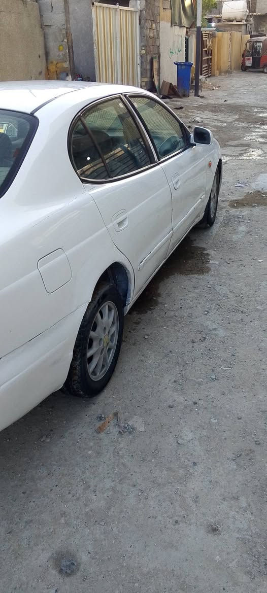 اسلام عليكم ساره دايو لكنزه موديل  2000 كهربائياتها كلها شغاله سنويه 27 تحويل ثاني يوم ماكينه خير من الله لا تنقيص ولا تبخير  الكير تجي بس نمره واحد فجاه وكف عندي باك يجي *********** عنوان بغداد البياع السعر  28 وبيها مجال
