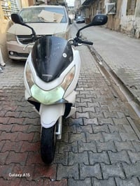 للبيع دراجه pcx ياباني الاصلي مكينه 150 برغي إذا مفتوح ترجع بشرط علفحص...
