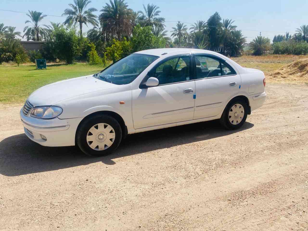 للبيع نيسان سني موديل ٢٠٠٢شركا العامه  رقم بغداد كير عادي تخم تاير تبريد ثلج كير محرك جيديد مكفول السعر٧٧وبيه مجال //***********// المكان واسط الصويره
