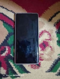 موبايل للبيع ذاكره 256 مستخدم اسبوع سعر ب 300 وبمجال07839701145