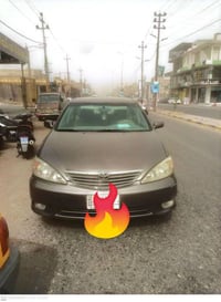 كامري موديل 2006  وراد امريكي السياره ضبغ عام رقم نجف ٤ ارقام شرط المد...