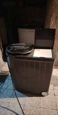 غسالة ملابس • للتواصل